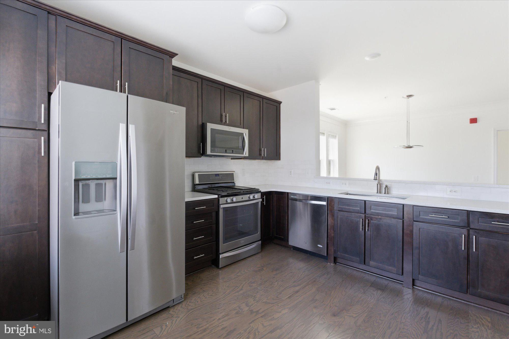 20650 Hope Spring Terrace, Unit 301 Ashburn, VA 20147 - Photo 18 of 35 Open kitchen