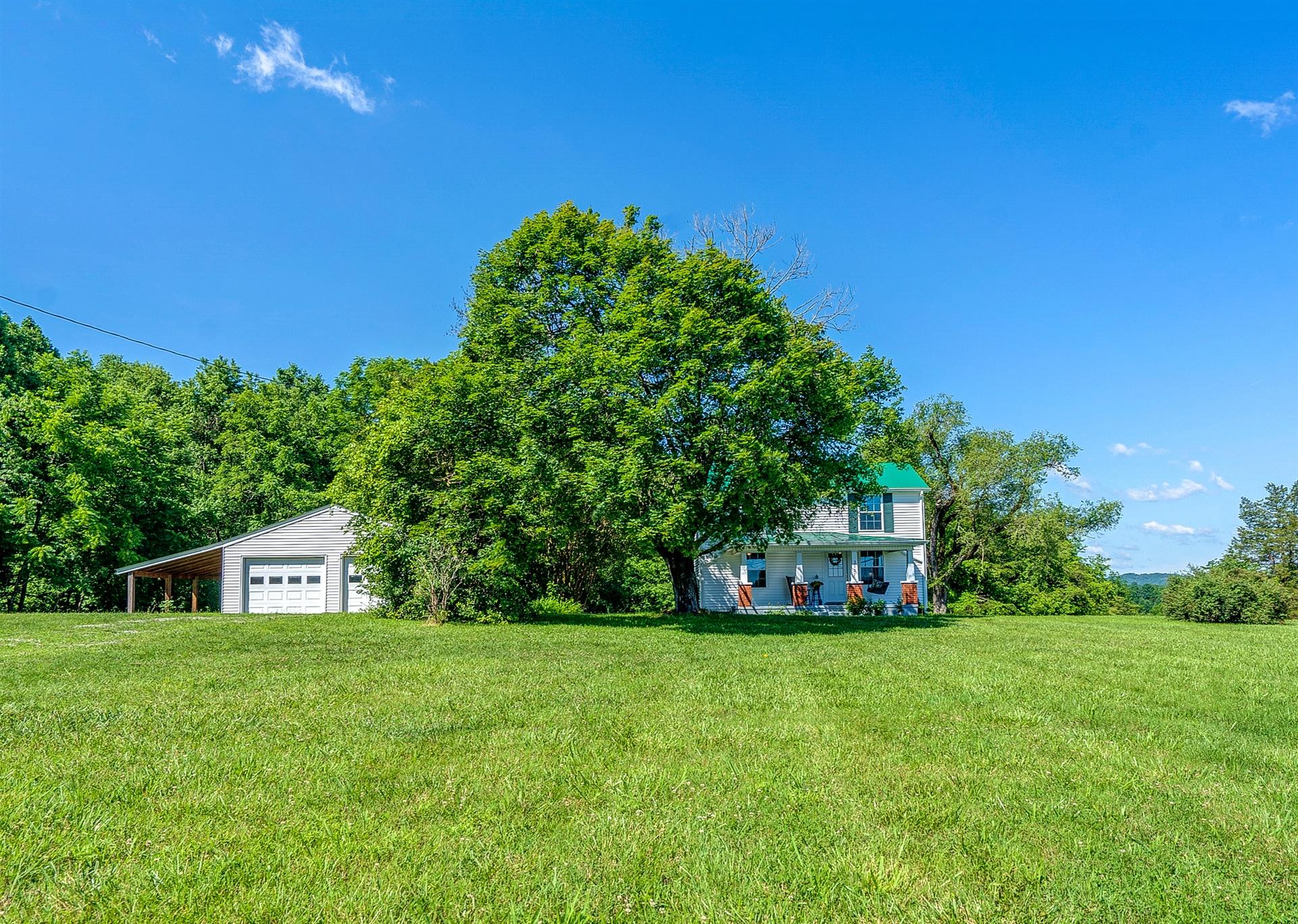 2137 Goodview Road Goodview, VA 24095 - Photo 4 of 37 a view of a house with a yard and sitting area