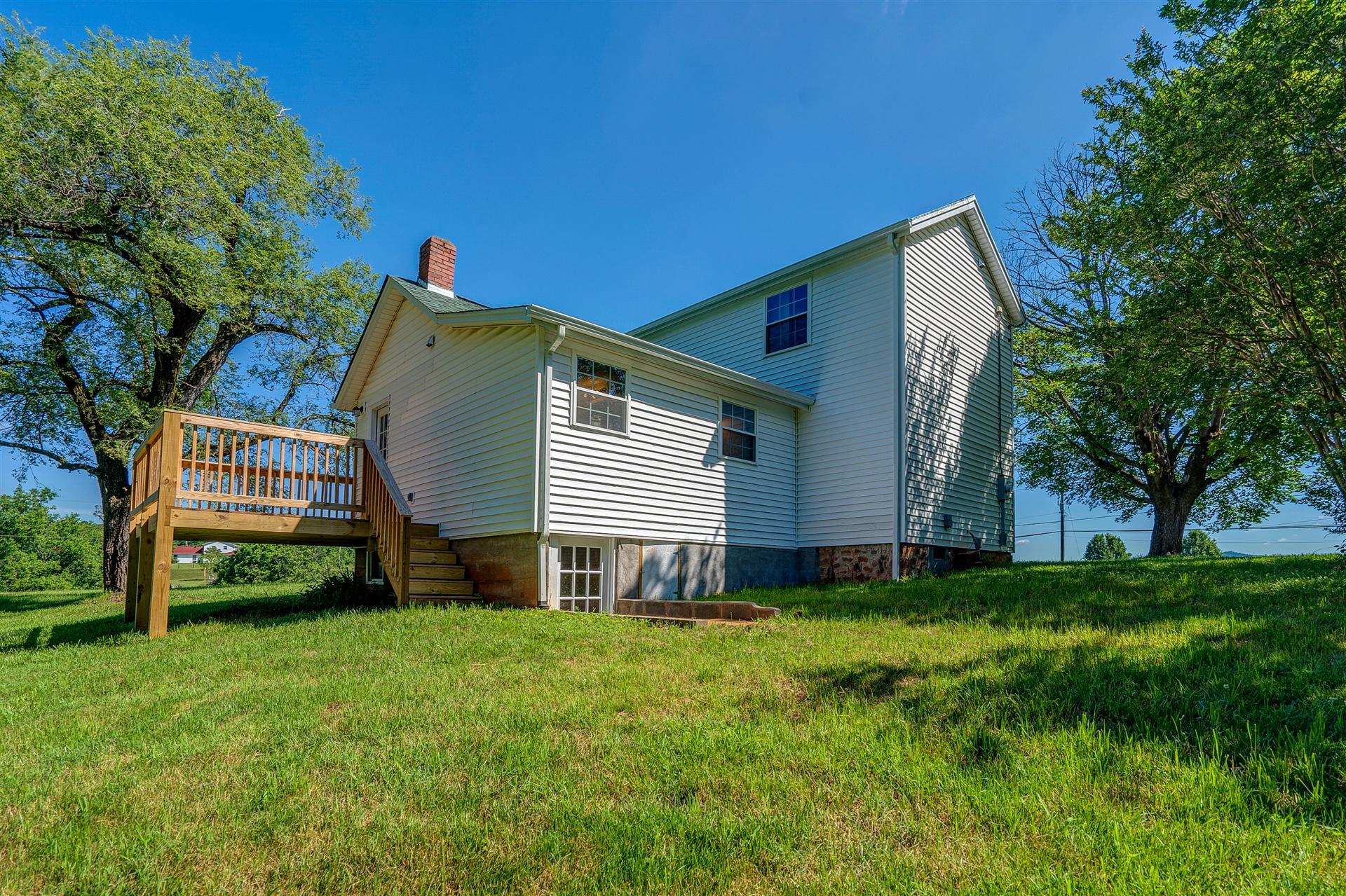 2137 Goodview Road Goodview, VA 24095 - Photo 33 of 37 a front view of house with yard and green space
