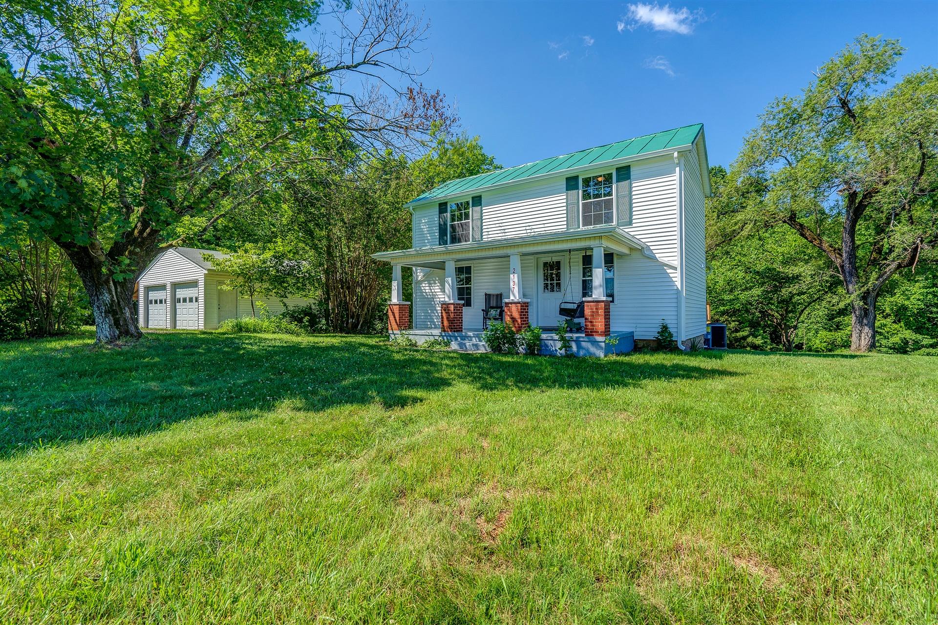 2137 Goodview Road Goodview, VA 24095 - Photo 34 of 37 a front view of house with yard and green space