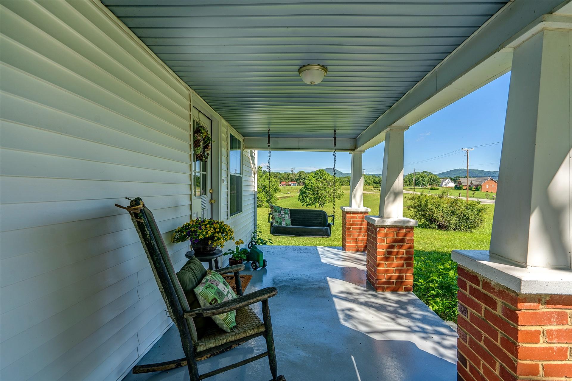 2137 Goodview Road Goodview, VA 24095 - Photo 5 of 37 a view of a porch with furniture