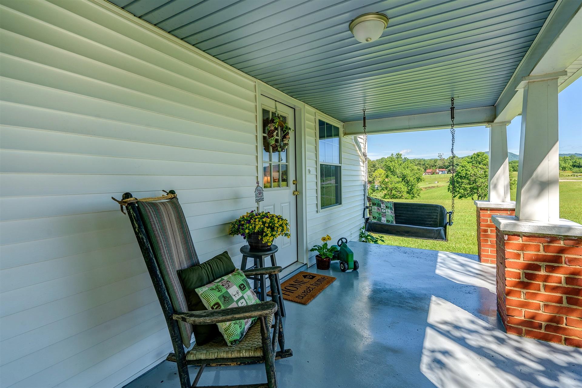 2137 Goodview Road Goodview, VA 24095 - Photo 6 of 37 a backyard of a house with seating space