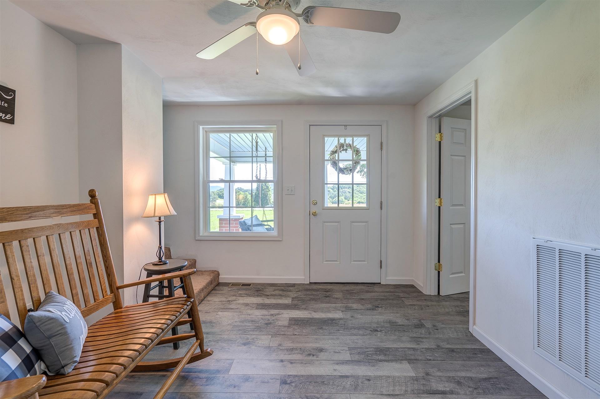 2137 Goodview Road Goodview, VA 24095 - Photo 7 of 37 a view of a livingroom with furniture and windows