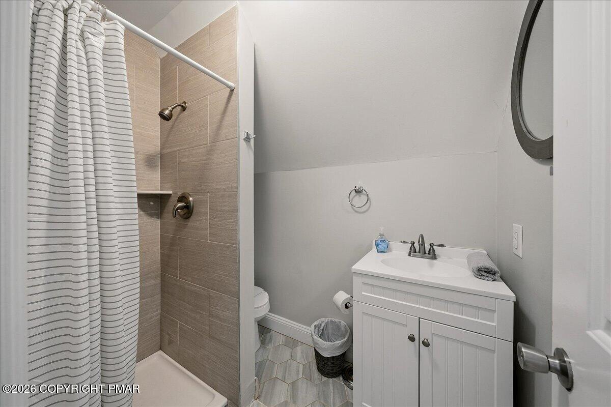369 Sidney Avenue Pocono Summit, PA 18346 - Photo 24 of 32 a bathroom with a sink toilet and shower