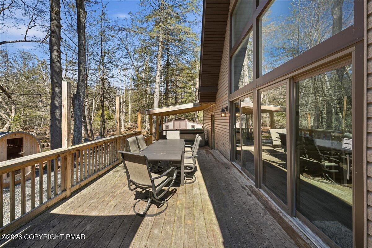 369 Sidney Avenue Pocono Summit, PA 18346 - Photo 26 of 32 a view of a balcony with chairs