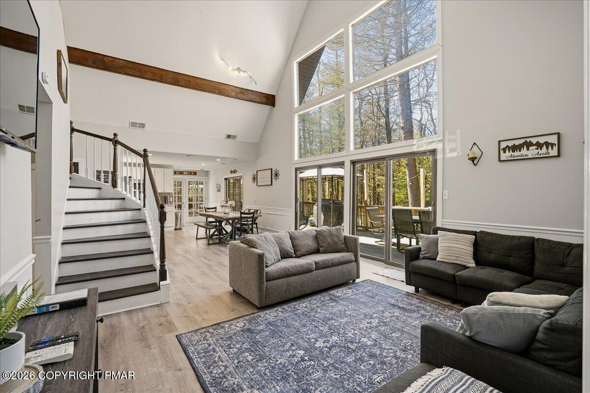 369 Sidney Avenue Pocono Summit, PA 18346 - Photo 4 of 32 a living room with furniture and a large window