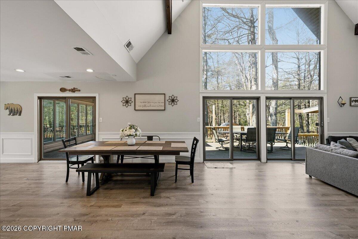 369 Sidney Avenue Pocono Summit, PA 18346 - Photo 5 of 32 a view of a workspace with furniture window and wooden floor