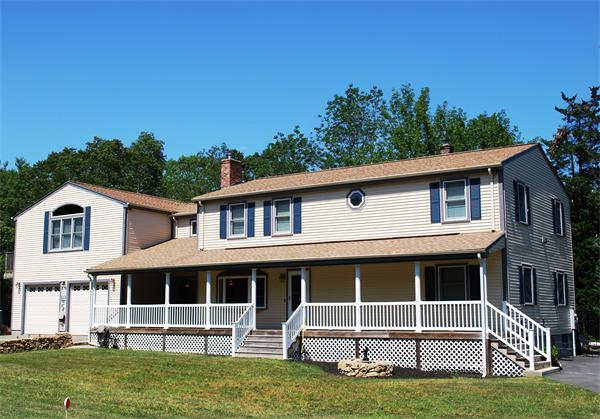 99 New Bedford Road Rochester, MA 02770 - Photo 3 of 23 a front view of a house with a yard