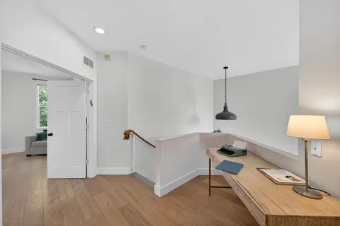 a kitchen that has a lot of cabinets