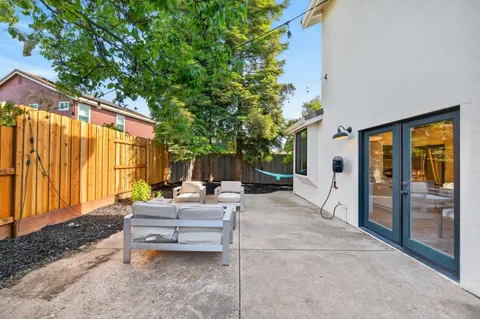 a building outdoor space with patio furniture