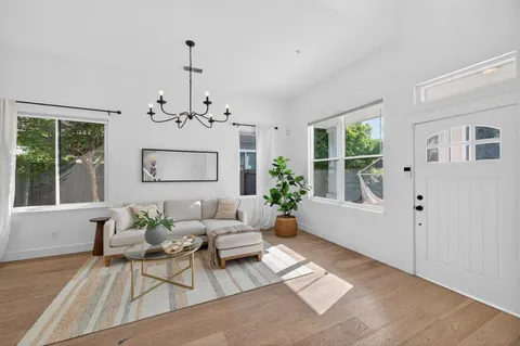a living room with furniture and window