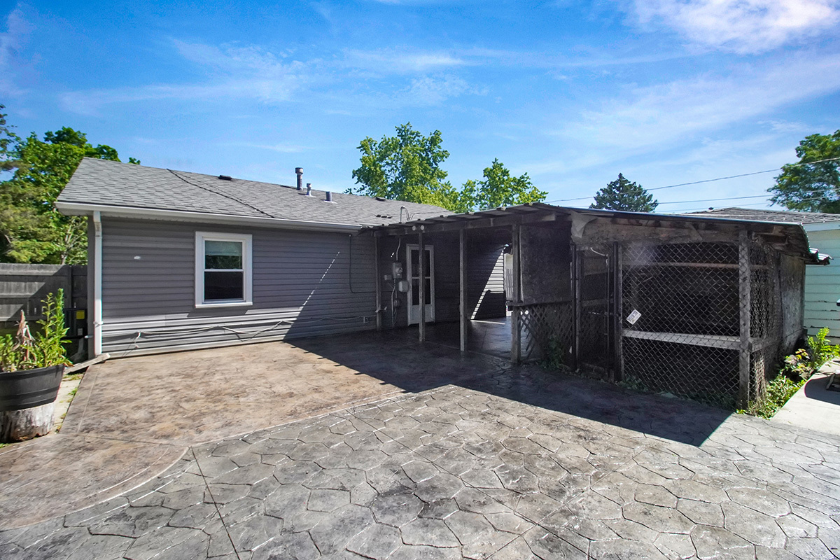 106 Louis Road Joliet, IL 60433 - Photo 12 of 14 a house view with a backyard space