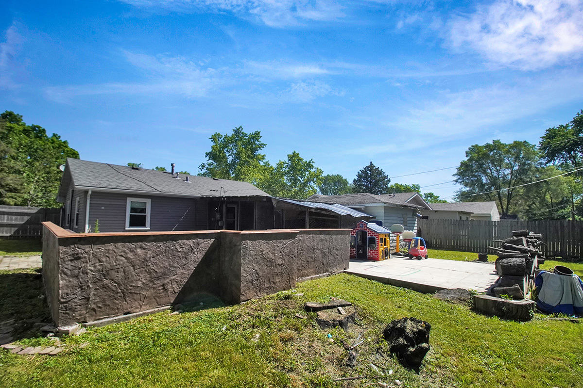106 Louis Road Joliet, IL 60433 - Photo 14 of 14 a view of a backyard with swimming pool and furniture
