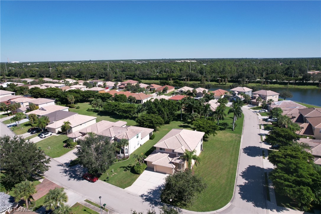 12956 Stone Tower Loop Fort Myers, FL 33913 - Photo 3 of 26 an aerial view of a house with lake view