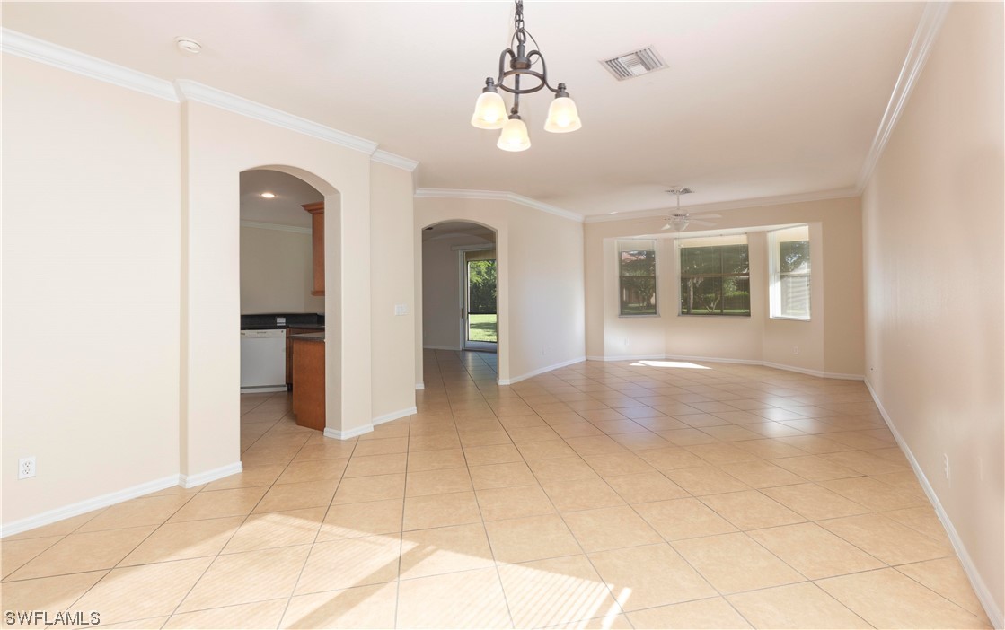12956 Stone Tower Loop Fort Myers, FL 33913 - Photo 5 of 26 a view interior of a house with an empty space and windows
