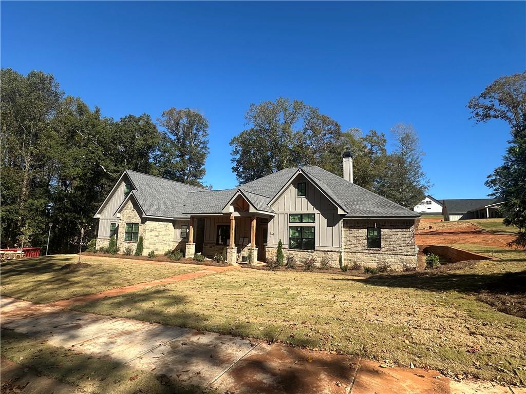 1652 Red Cedar Road Commerce, GA 30530 - Photo 2 of 9 a front view of a house with a yard