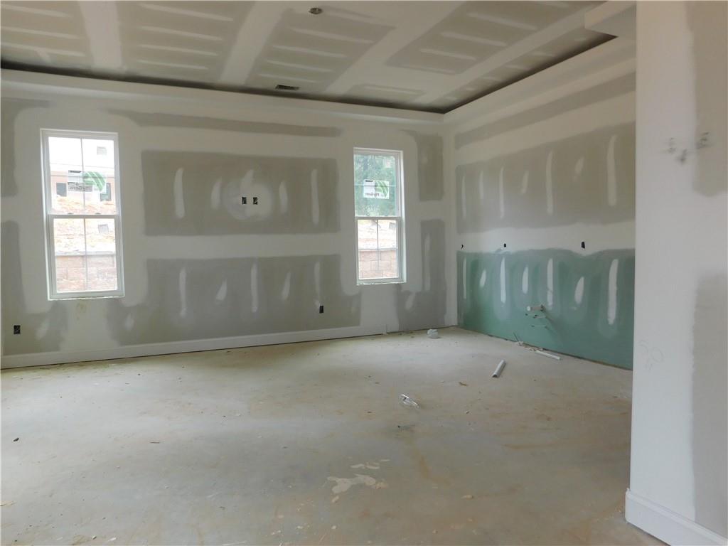 1652 Red Cedar Road Commerce, GA 30530 - Photo 5 of 9 an empty room with windows