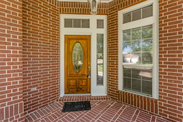 a view of a brick building with a door