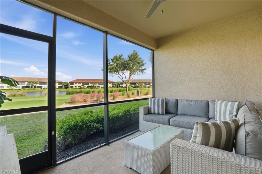 9374 Pocida Court, Unit 101 Naples, FL 34119 - Photo 23 of 32 a living room with couch and a window