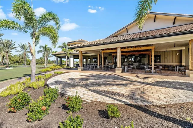 a bathroom with a sink and cabinets