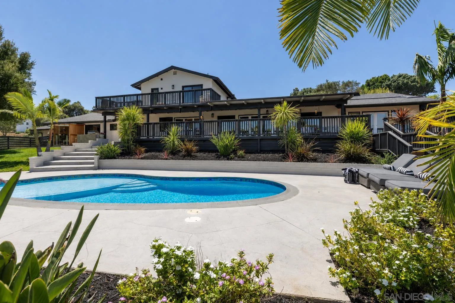 521 Rancho Camino Fallbrook, CA 92028 - Photo 56 of 72 a front view of a house with swimming pool