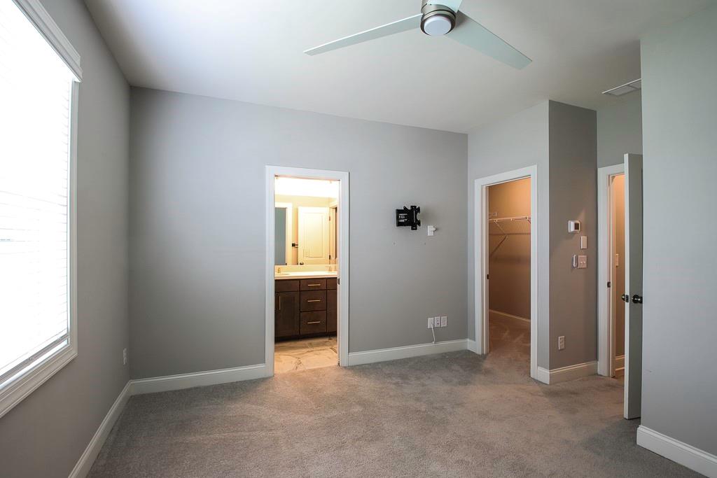1345 Parc Bench Road Atlanta, GA 30316 - Photo 5 of 6 an empty room with windows and closet