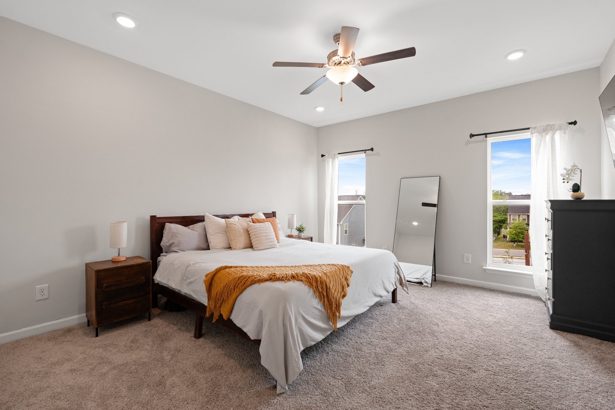 616 Castle Road Mount Juliet, TN 37122 - Photo 11 of 27 a bedroom with a bed and a chandelier