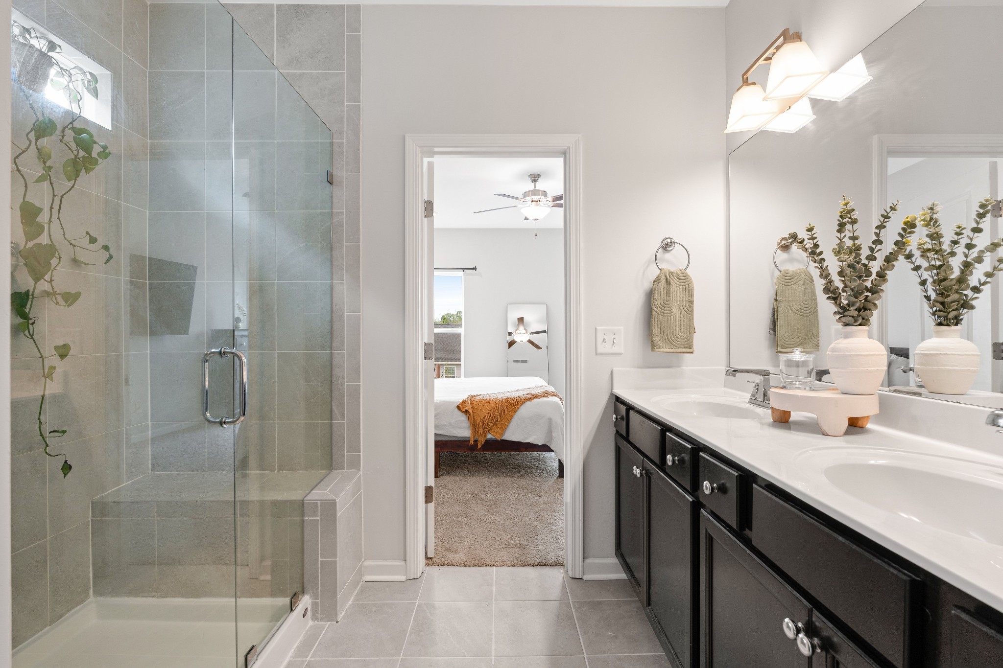 616 Castle Road Mount Juliet, TN 37122 - Photo 12 of 27 a en suite bathroom with a double vanity sink mirror and shower