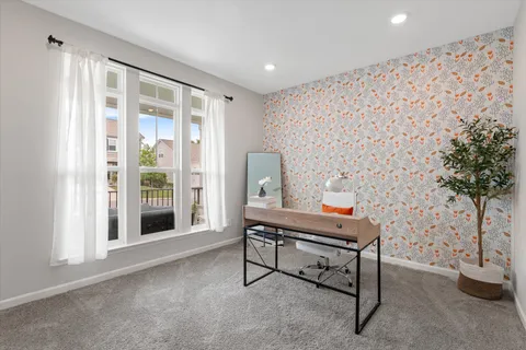 a room with furniture and a window