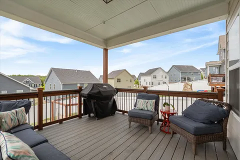 a view of balcony with furniture