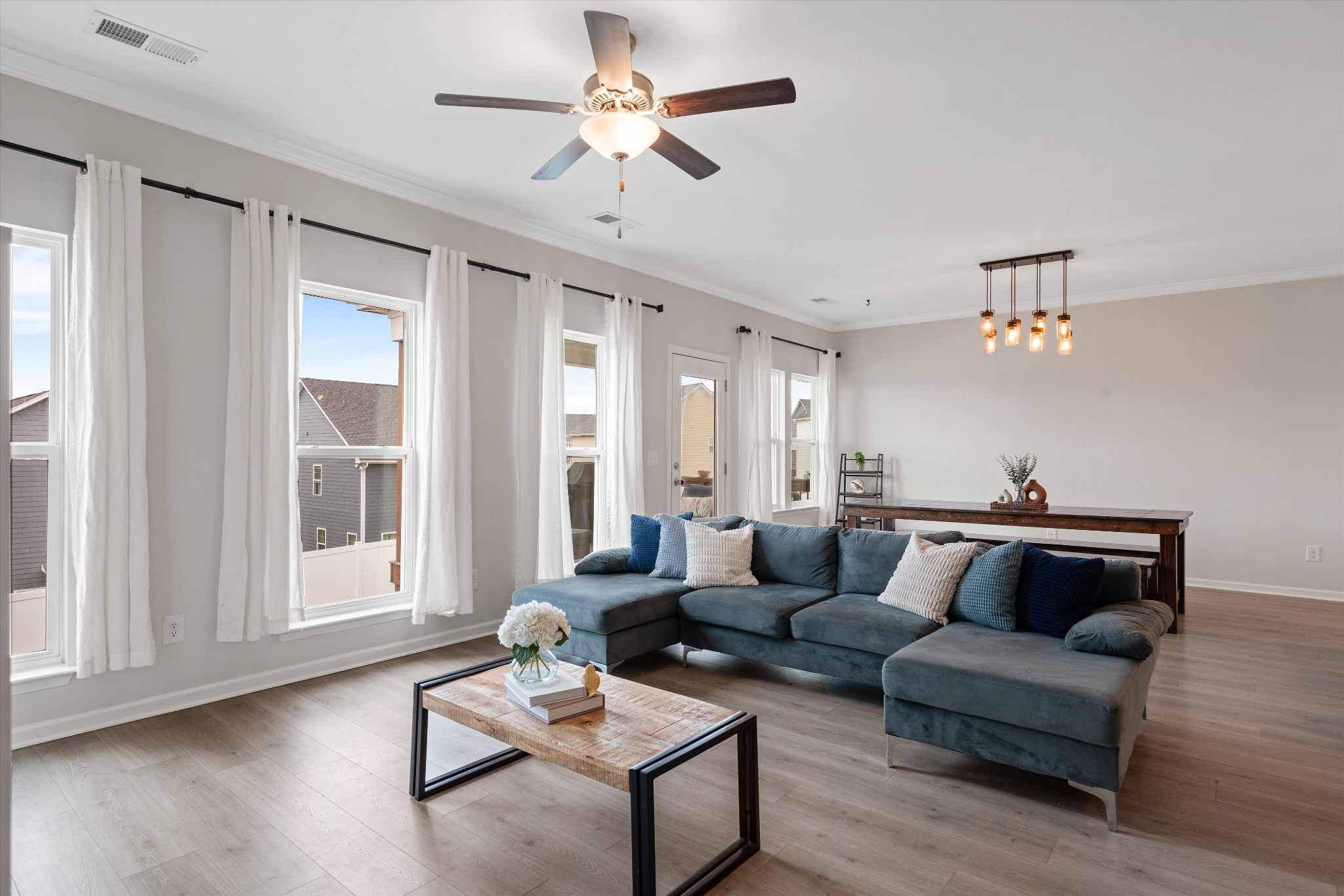 616 Castle Road Mount Juliet, TN 37122 - Photo 5 of 27 a living room with furniture and wooden floor