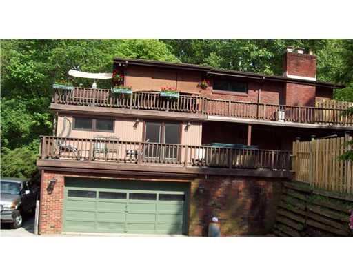 476 Woodland Road Pittsburgh, PA 15237 - Photo 16 of 17 Exterior Back. 2 Private Decks for entertaining 4 car garages upper & lower garages