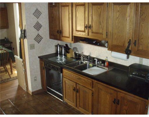 476 Woodland Road Pittsburgh, PA 15237 - Photo 3 of 17 Kitchen. Updated kitchen with ceramic flooring Updated Appliances and updated cabinets Easy acess to the deck for grilling & entertaining