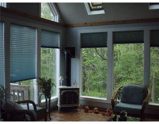 476 Woodland Road Pittsburgh, PA 15237 - Photo 4 of 17 Other Conference Room. Sunroom Fist floor Airy & bright Cathedral Ceilings & Vermont Castings gas stove for after dinner coffee