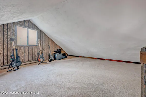 a view of livingroom with furniture and cabinet