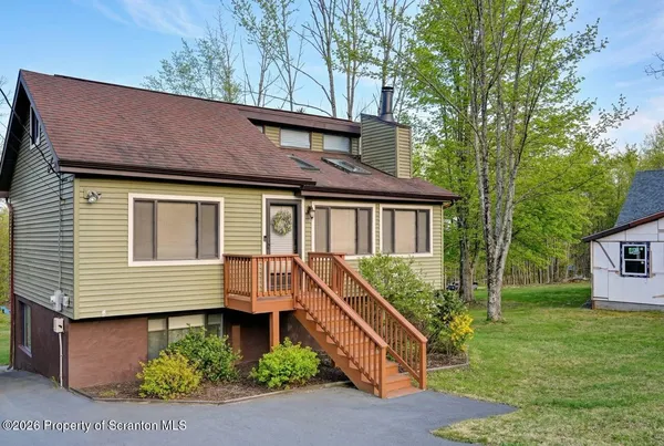 a view of house and outdoor space