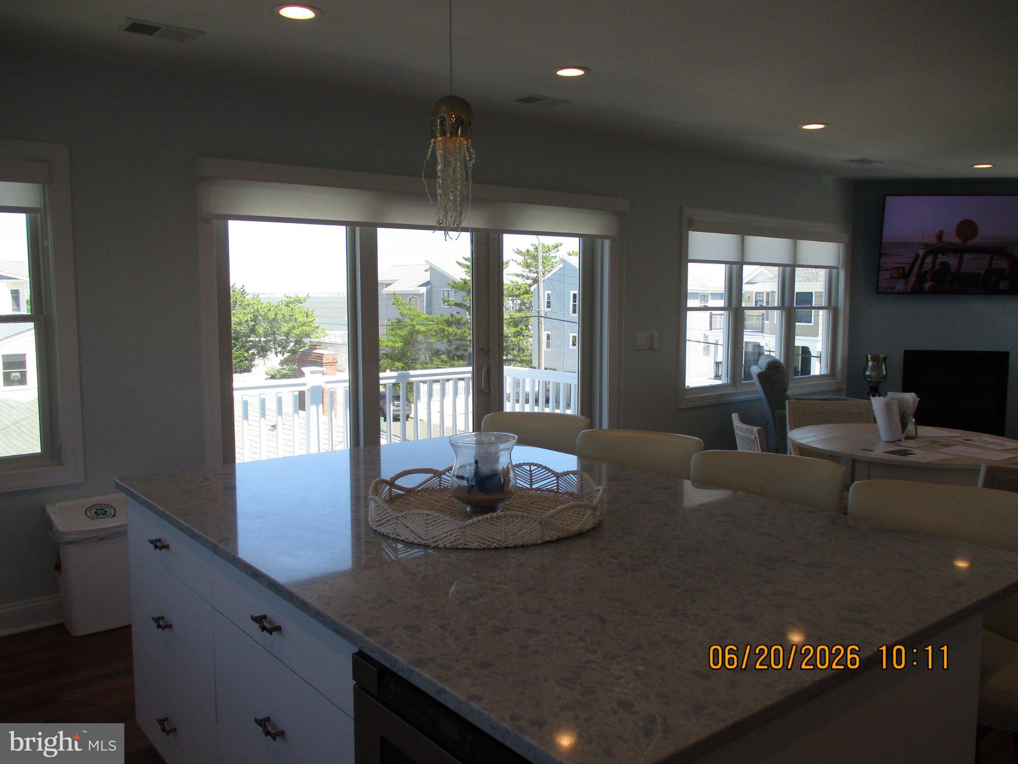 24 West 53rd Street Long Beach Township, NJ 08008 - Photo 67 of 75 a living room with hard wood floors and a large window
