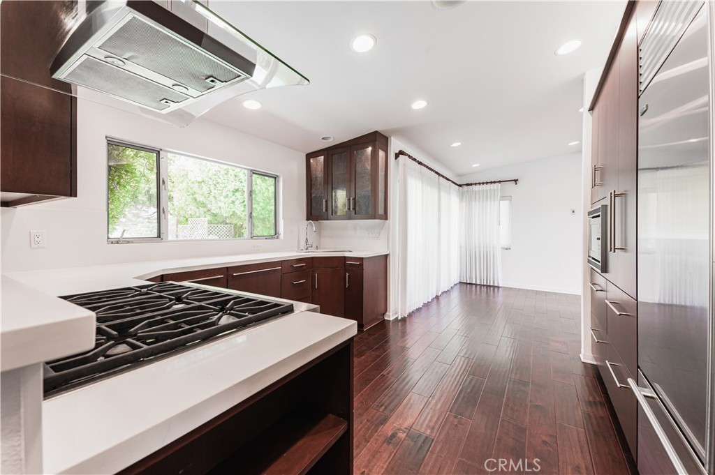 105 West Kenneth Road Glendale, CA 91202 - Photo 17 of 48 a kitchen with sink stove and refrigerator
