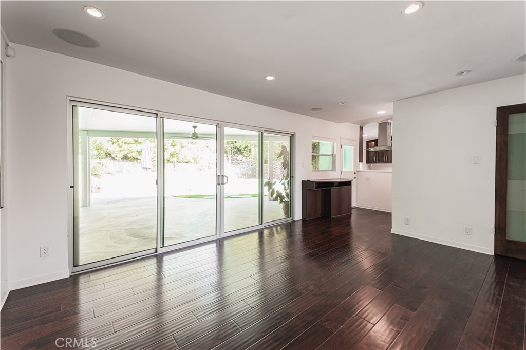 105 West Kenneth Road Glendale, CA 91202 - Photo 21 of 48 a view of an empty room with wooden floor and a window
