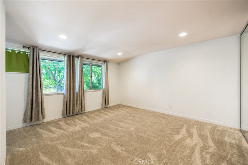 105 West Kenneth Road Glendale, CA 91202 - Photo 24 of 48 a view of an empty room with a window