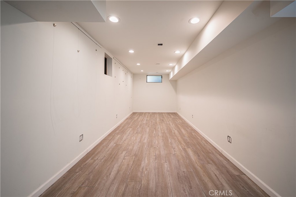 105 West Kenneth Road Glendale, CA 91202 - Photo 47 of 48 a view of a room with wooden floor and hallway