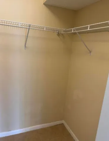 a view of a room with racks on the wall