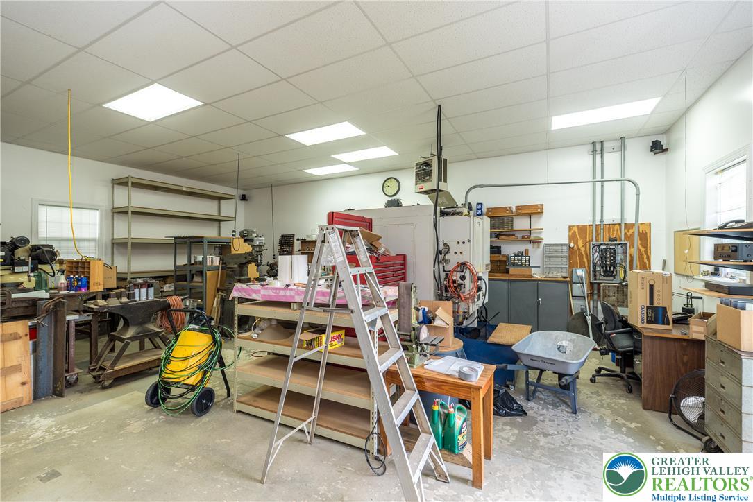 1815 Leithsville Road Hellertown, PA 18055 - Photo 29 of 38 A dedicated workshop area provides ample space for projects and storage.