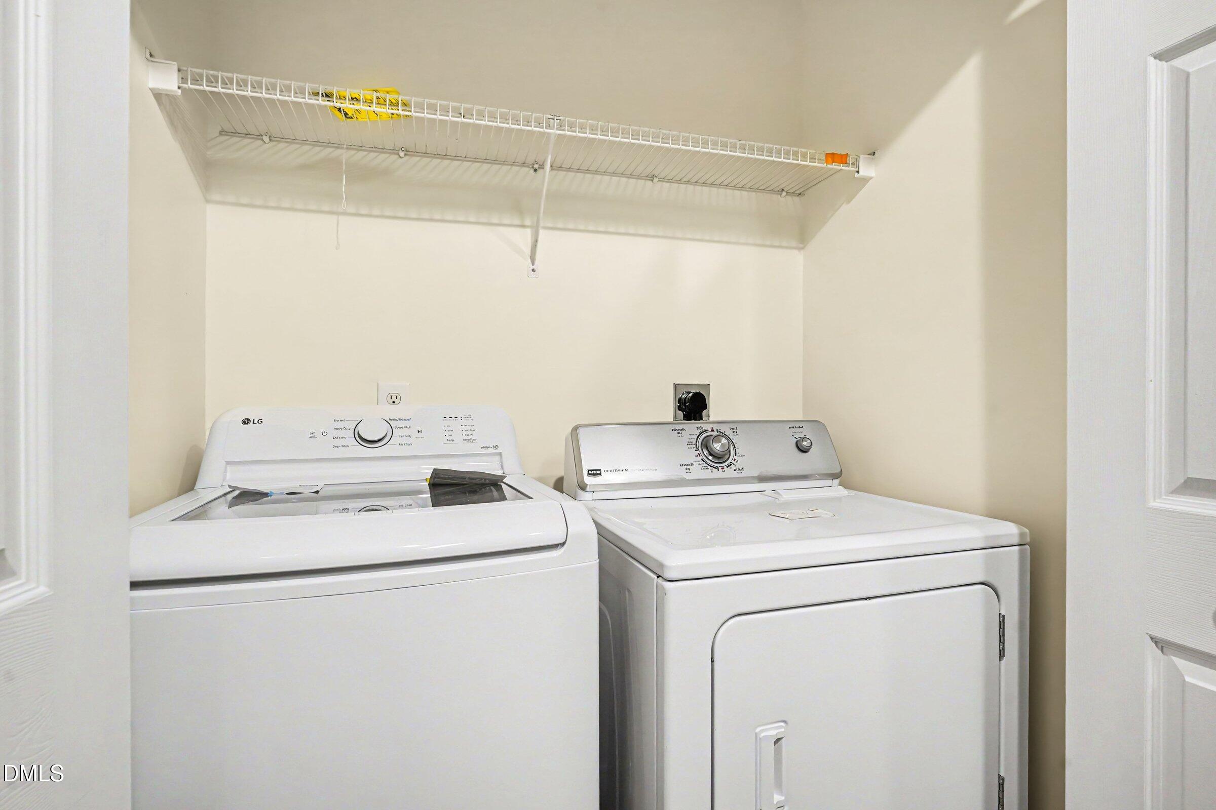 2651 Mellowfield Drive, Unit 203 Raleigh, NC 27604 - Photo 21 of 32 a utility room with dryer and washer