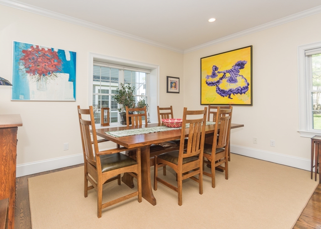 128 Church Street, Unit 2 Waltham, MA 02452 - Photo 5 of 41 a view of a dining room with furniture window and outside view