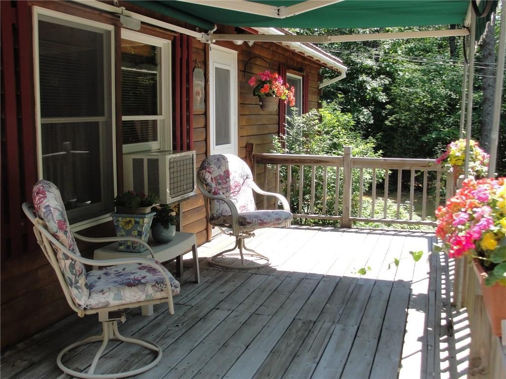 Front door off the deck as well as a...