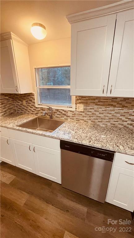 3246 Daystar Road Lancaster, SC 29720 - Photo 7 of 13 a kitchen with granite countertop a sink and a stove