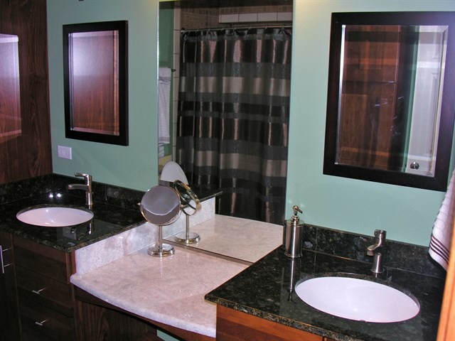 7209 Cornflower Way Spring Grove, IL 60081 - Photo 24 of 25 a bathroom with a granite countertop sink a mirror and shower