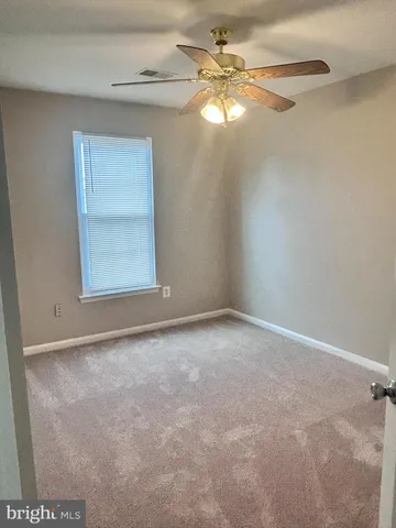 a view of small space with racks on the wall