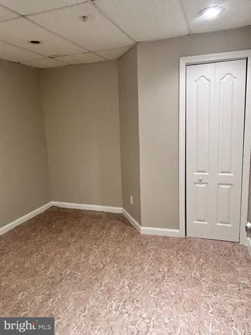 a room with lots of different colored cloths